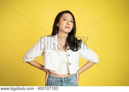 Sad Portrait Of Young Asian Woman Over Isolated Background