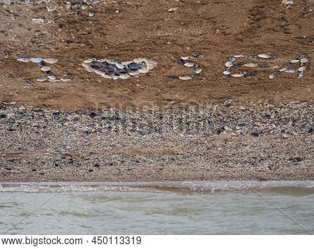 The Inscription On The Beach-i Love The Sea. Signs And Symbols. On The Sea Sand-shell Beach, The Tex