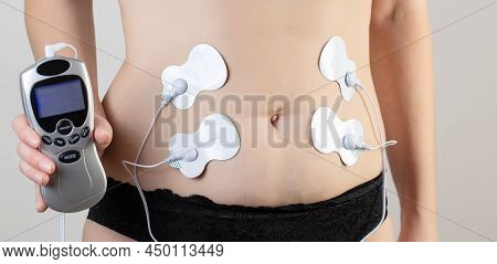 A Modern Electronic Acupuncture For Burning Belly Fat And Strengthening Muscles On The Girl's Body,