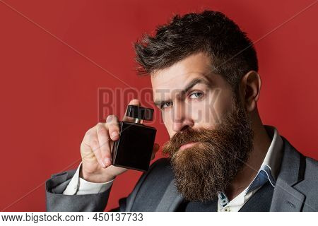 Perfume Or Cologne Bottle, Perfumery, Cosmetics, Scent Cologne Bottle, Male Holding Cologne. Masculi