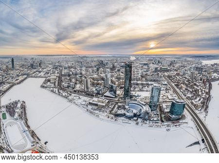 Yekaterinburg Aerial Panoramic View In Winter At Sunset. Yekaterinburg City And Pond In Winter.