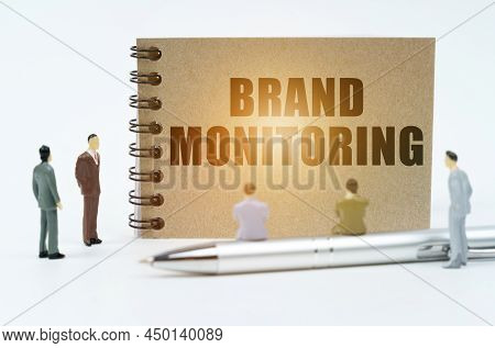 Finance Concept. On A White Background There Are Figures Of Businessmen, There Is A Pen On Which The