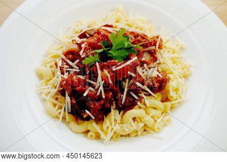 Elbow Macaroni With Bolognese Meat Sauce And Parmesan Cheese