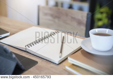 Diary And Planner Book On School Table For Student, Study For Exam. Wooden Desk With Laptop, Tablet,