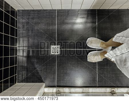 Floor Drain, Running Water In Shower, White And Black Tiles
