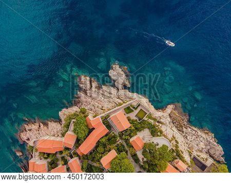 Aerophotography. View From Flying Drone. Panoramic View Of Sveti Stefan Island In Budva In A Beautif