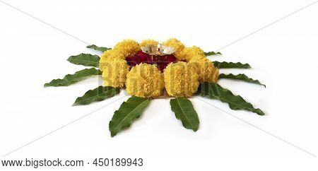 Flower Rangoli For Diwali Or Pongal Made Using Marigold Or Zendu Flowers And Red Rose Petals Over Wh