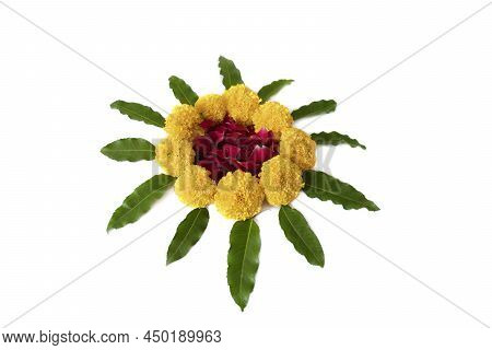 Flower Rangoli For Diwali Or Pongal Made Using Marigold Or Zendu Flowers And Red Rose Petals Over Wh