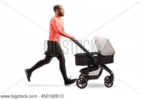 Full length profile shot of a father pushing a baby stoller and jogging isolated on white background