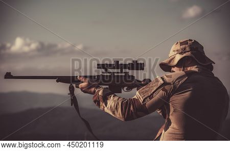 Hunter Classic. Hunter With Hunting Gun. Man Hunter With A Gun. Closed And Open Hunting Season. Man 