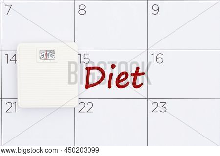 Starting Diet Date Concept On A Calendar With A Weight Scale For Your Diet Message