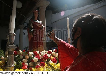 Salvador, Bahia, Brazil - December 13, 2021: Faithful Celebrate Santa Luzia Day - Patron Of Ophthalm