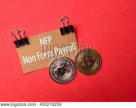 Top View Digital Currency With Text Nfp Non Form Payroll On Red Background.