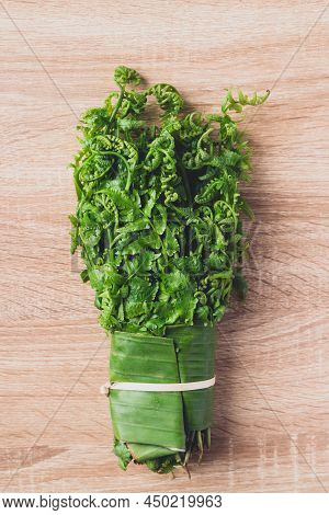 Asian Edible Fern Or Fiddlehead Fern From Local Farmer Market, Healthy Leaf Vegetable In Spring Seas
