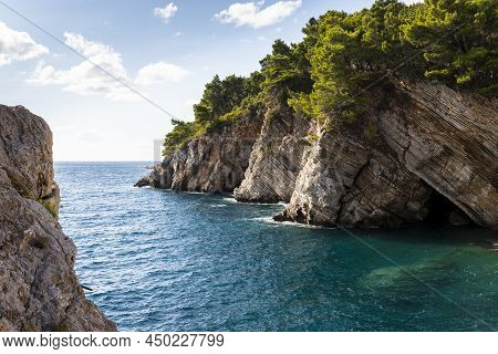 Sea And Rocky Clifs In Town Petrovac, Montenegro