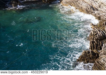 Water Surface And Splashing Waves At Clifs