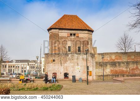 Zwolle, Netherlands - March 03, 2021: Historic Wijndragerstoren Tower And City Wall In Zwolle, Nethe