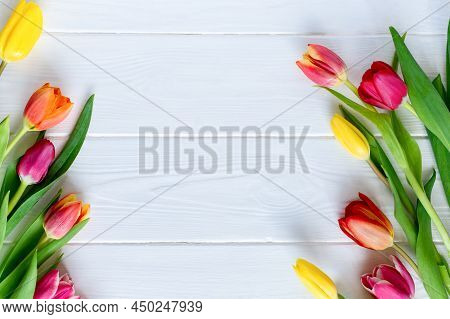 Colorful Tulips Flower Composition Over White Wooden Table Background With Copy Space. Love, Mothers