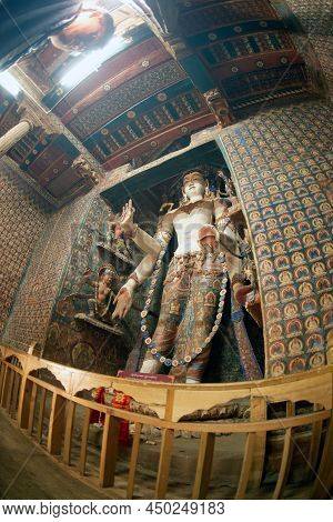 Ladakh , India- May 15,2019 : A Large Buddha Image Or God Made Of Wood. Located Inside Alchi Monaste