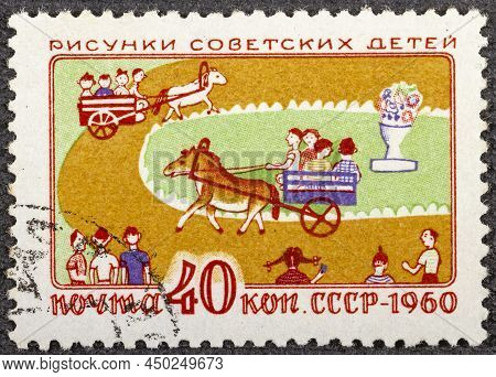 Ussr-circa 1960: A Post Stamp Printed In Ussr Showis Dessin - Children Riding On A Pony.