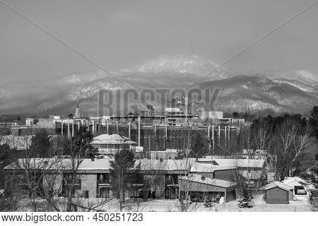Architectural Pyramid Of Housing, Industry And Magog Hospital In Front Of Mount Orford, Quebec, Cana