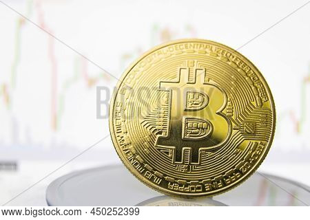 Bitcoin Coin On The Background Of The Chart