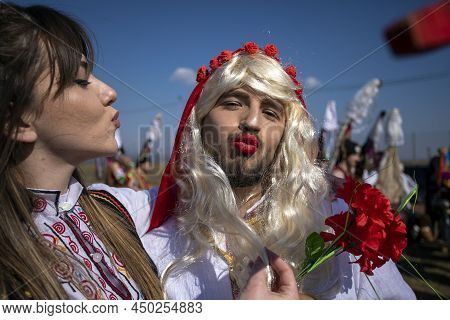 Elin Pelin, Bulgaria - February 26, 2022: Masquerade Festival In Elin Pelin, Bulgaria. People With M
