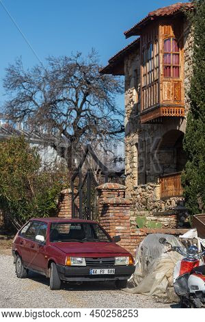 Side, Turkey -february  13, 2022: Red Vaz 2109  Is Parked  On The Street On A Warm Day Against The B