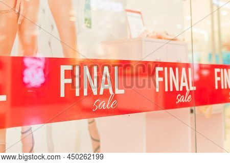 Final Sale White Word On Red Fabrik Backdrop In Shop Window. Summer Sale. Special Offer, Big Sale Co