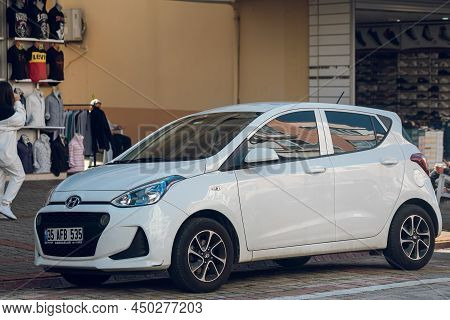 Side, Turkey - February 16 2022:  White  Hyundai I10  Is Parking  On The Street On A  Summer Day Aga
