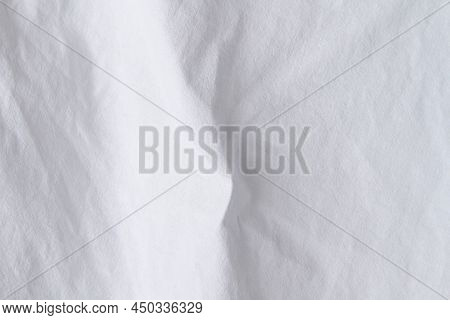 Texture Of White Fabric. White Background Close Up. Factory Fabric In White. White Fabric Background