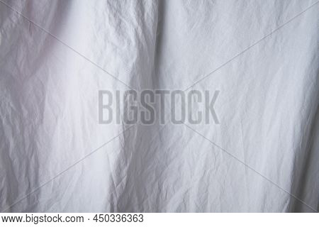 Texture Of White Fabric. White Background Close Up. Factory Fabric In White. White Fabric Background