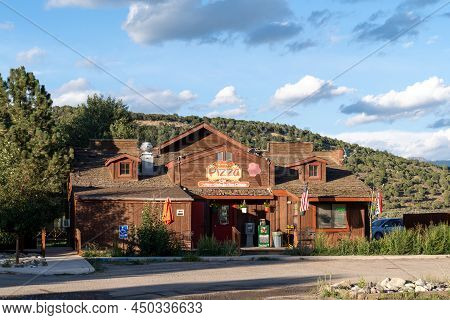 Ridgway, Colorado - August 3, 2021: Exterior Of Panny's Pizza Restaurant On A Summer Day