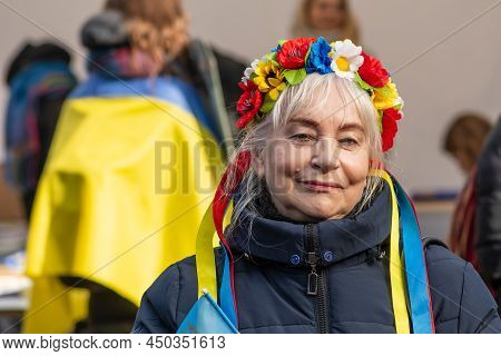 Vilnius, Lithuania - March 2, 2022: Beautiful Smiling Ukrainian Lady With Flowers Crown During A Pea