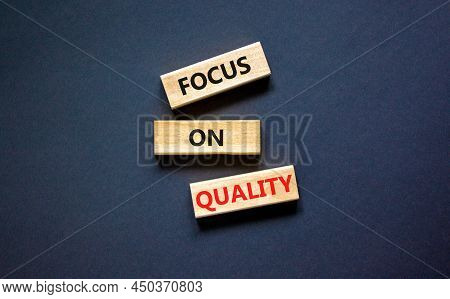 Focus On Quality Symbol. Concept Words Focus On Quality On Blocks On Beautiful Black Table Black Bac
