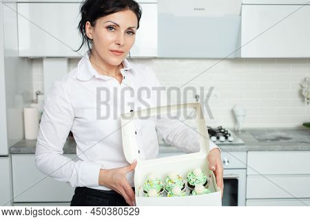 The Pastry Chef Professional Prepared Cupcakes In Form Of Christmas Trees. Delicious Sweets For Any 