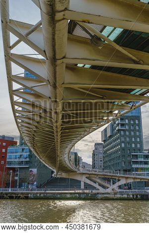 Bilbao, Spain, February 15, 2022. Zubizuri Bridge Over The Nervion River In The City Of Bilbao, Spai
