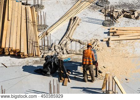 Closeup Of House Foundation Made From Concrete Shuttering Blocks Filled With Mortar And Reinforcemen