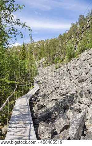 View Of The Pyha-luosto National Park In Summer, Wooden Walkway And Rocks, Lapland, Finland