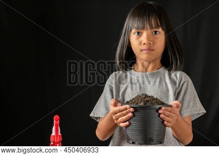 Children Planting Vegetable On Planting Pot. Kid Leisure Activitie. Young Asian Girl Happy To Prepar