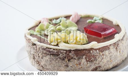 A Kyiv Cake On A Blue Plate. It's A Brand Of Dessert Cake Made In Kyiv, Ukraine. Kyiv Cake With Choc
