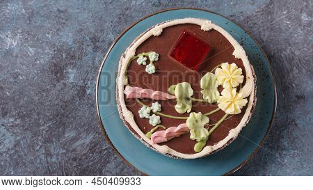 A Kyiv Cake On A Blue Plate. It's A Brand Of Dessert Cake Made In Kyiv, Ukraine. Kyiv Cake With Choc