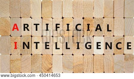 Ai Artificial Intelligence Symbol. Concept Words Ai Artificial Intelligence On Wooden Blocks On A Be
