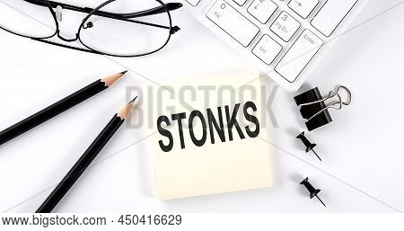 Text Stonks On Sticker With Keyboard , Pencils And Office Tools