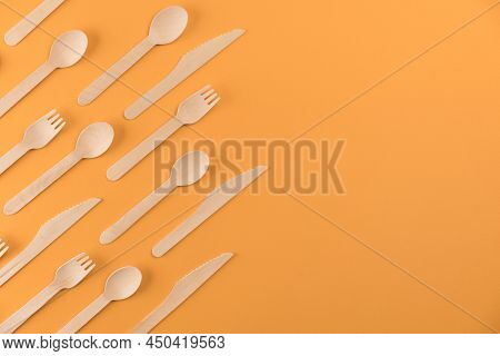 Flat Lay With Natural Wooden Cutlery Set Made Of Natural Bamboo - Biodegradable And Compostable Cutl