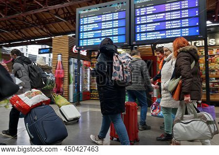 Bucharest, Romania - March 03, 2022:  Ukrainian Refugees From Ukraine Board The Train To Vienna At T