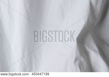 Texture Of White Fabric. White Background Close Up. Factory Fabric In White. White Fabric Background