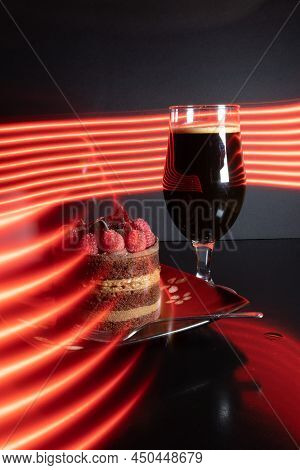 Chocolate Stout Beer With Chocolate Cake And Raspberries