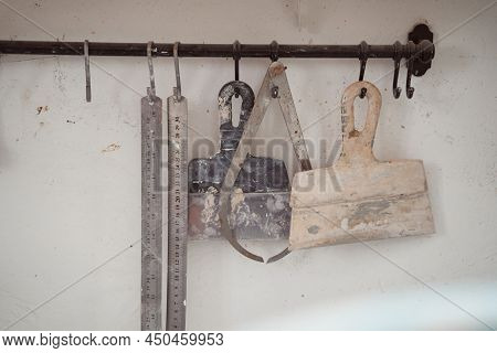 Used Dirty Pottery Instruments Stored On Heavy-duty Magnetic Tool Holder