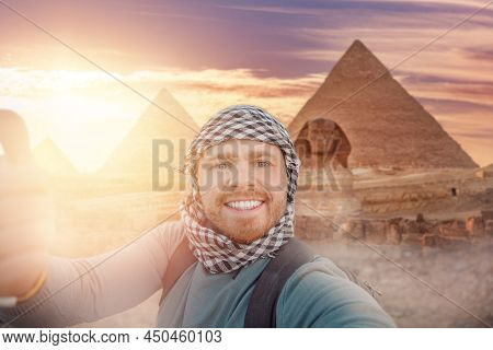 Travel Selfie Photo Man In Hat Background Pyramid Of Egyptian Giza And Sphinx, Sunset Cairo, Egyp